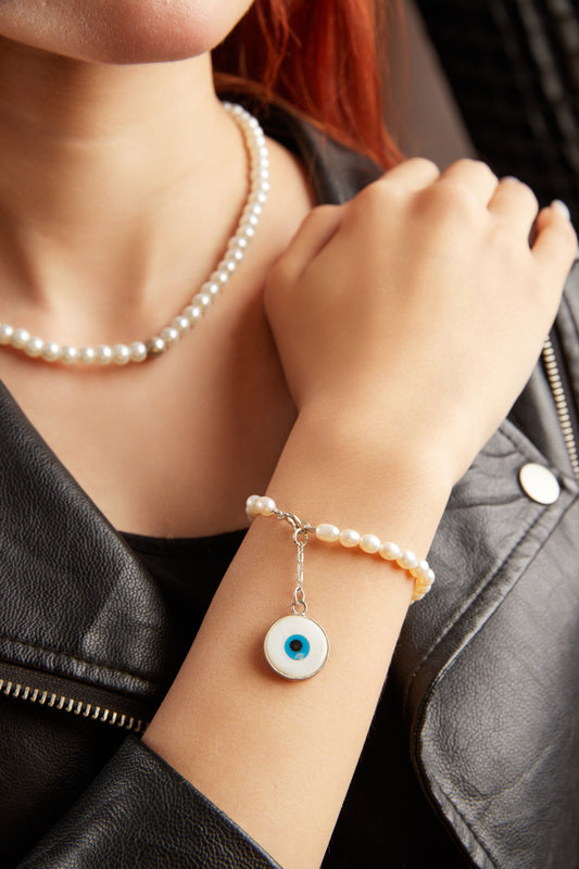 PEARL BRACELET WITH EVIL EYE